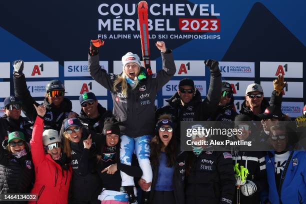 Silver medalist Mikaela Shiffrin of United States celebrates with team members during the victory ceremony for Women's Super G at the FIS Alpine...