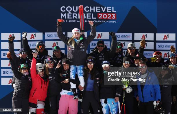 Silver medalist Mikaela Shiffrin of United States celebrates with team members during the victory ceremony for Women's Super G at the FIS Alpine...