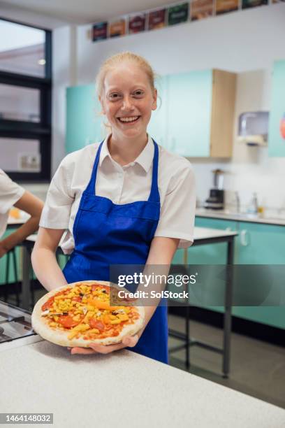 proud of my pepperoni pizza - home economics class stock pictures, royalty-free photos & images