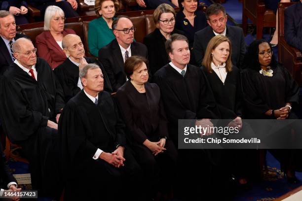 Former Supreme Court justices Anthony Kennedy and Stephen Breyer join Chief Justice John Roberts and current associate justices Elena Kagan, Brett...