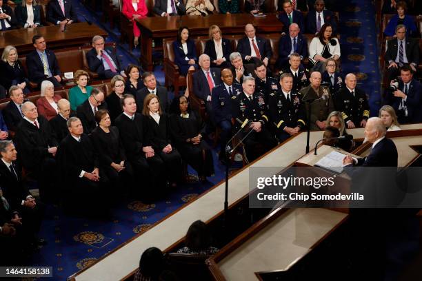 Current and former justices of the U.S. Supreme Court and the Joint Chiefs of Staff listen to President Joe Biden as he delivers the State of the...