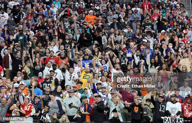 Fans reach out for T-shirts during the 2023 NFL Pro Bowl Games at Allegiant Stadium on February 05, 2023 in Las Vegas, Nevada.