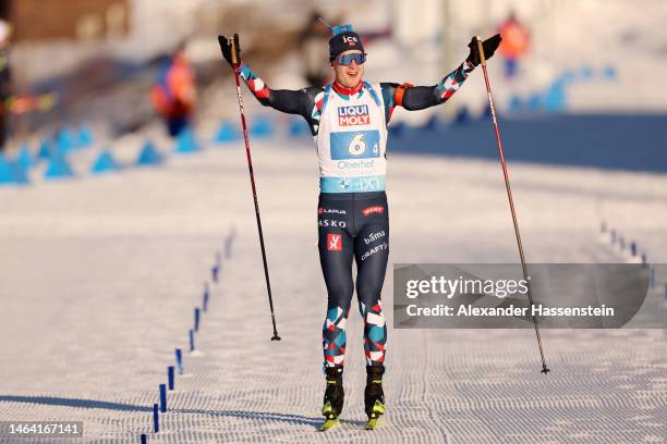 Johannes Thingnes Boe of Norway celebrates crossing the finish line to win the Mixed Relay at the IBU World Championships Biathlon Oberhof at Arena...