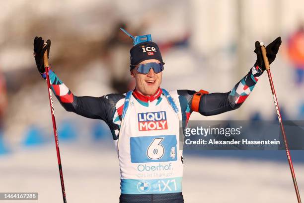 Johannes Thingnes Boe of Norway celebrates crossing the finish line to win the Mixed Relay at the IBU World Championships Biathlon Oberhof at Arena...
