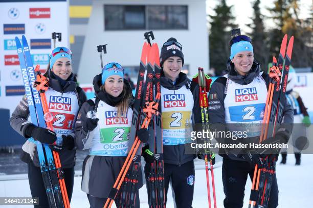 Silver medalists Lisa Vittozzi, Dorothea Wierer, Didier Bionaz and Tommaso Giacomel of Italy pose for a photo during the victory ceremony for the...