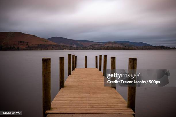 scenic view of lake against sky,lake district national park,united kingdom,uk - jetty stock pictures, royalty-free photos & images