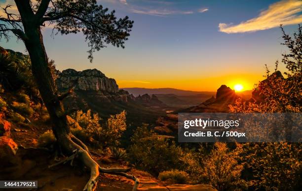 scenic view of landscape against sky during sunset,sedona,arizona,united states,usa - sedona stockfoto's en -beelden