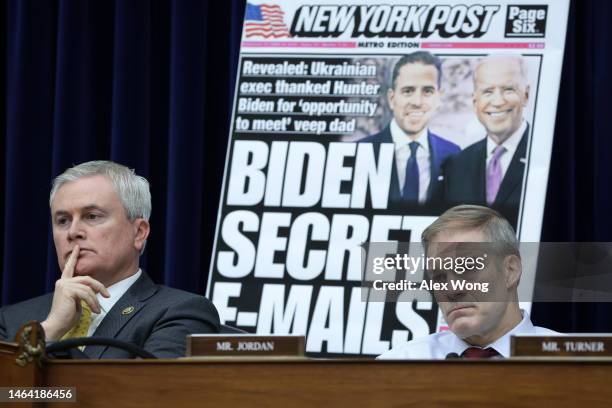 With a poster of a New York Post front page story about Hunter Biden’s emails on display, Committee Chairman Rep. James Comer and Rep. Jim Jordon...