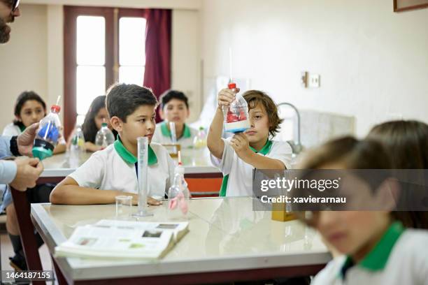 pre-adolescent students working on science project - pre adolescent child bildbanksfoton och bilder