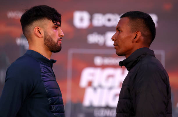 Adam Azim of England and his opponent Santos Reyes go head-to-head during the BOXXER Fight Week Media Day at BOXPARK Wembley on February 08, 2023 in...