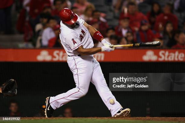 Albert Pujols of the Los Angeles Angels of Anaheim fouls a pitch off his foot against the Arizona Diamondbacks in the ninth inning at Angel Stadium...