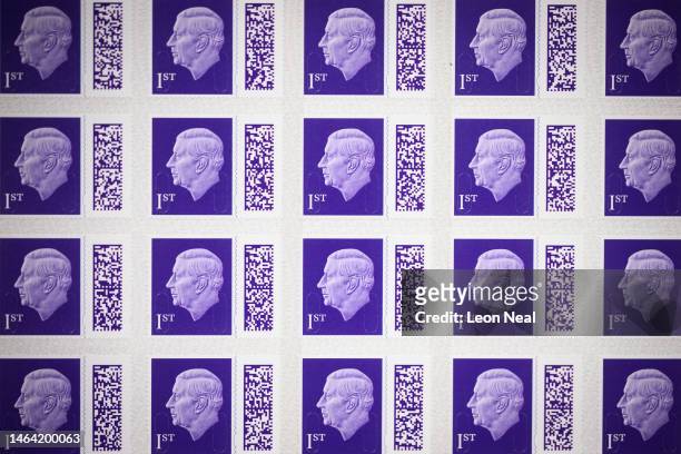 Sheet of the new first class stamps featuring a likeness of King Charles III is seen in a display case at the Royal Mail Museum on February 08, 2023...