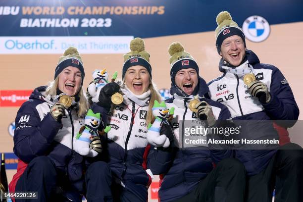 Gold medalists Ingrid Landmark Tandrevold, Marte Olsbu Roeiseland, Sturla Holm Laegreid and Johannes Thingnes Boe of Norway pose with their Gold...