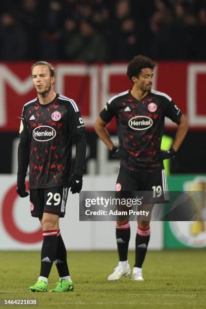 Jorrit Hendrix and Emmanuel Iyoha of Fortuna Düsseldorf react during the DFB Cup round of 16 match between 1. FC Nürnberg and Fortuna Düsseldorf at...