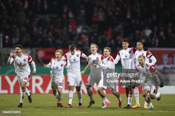 Players of 1. FC Nürnberg react during the penalty shoot out at the DFB Cup round of 16 match between 1. FC Nürnberg and Fortuna Düsseldorf at...