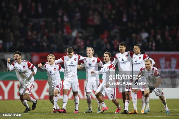 Players of 1. FC Nürnberg react during the penalty shoot out at the DFB Cup round of 16 match between 1. FC Nürnberg and Fortuna Düsseldorf at...