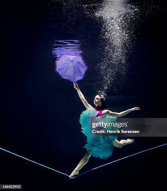 line dancer underwater - woman tightrope stock pictures, royalty-free photos & images