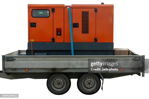 orange diesel generator attached to a trailer - trailer stock-fotos und bilder