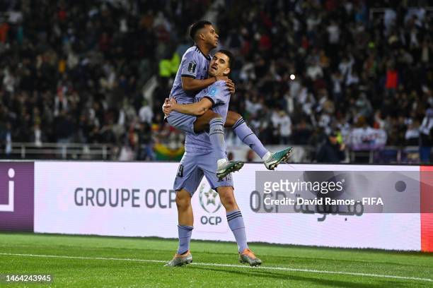 Rodrygo of Real Madrid celebrates after scoring the team's third goal with teammate Dani Ceballos during the FIFA Club World Cup Morocco 2022 Semi...