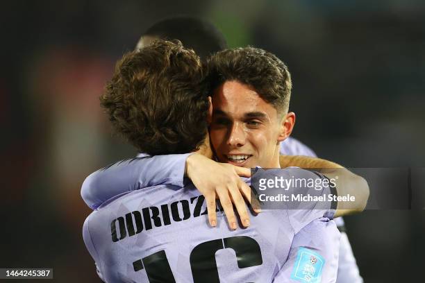 Sergio Arribas of Real Madrid celebrates with teammate Alvaro Odriozola after scoring the team's fourth goal during the FIFA Club World Cup Morocco...