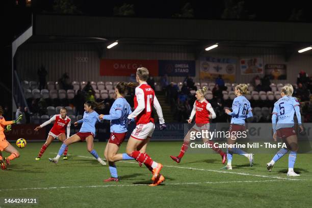 Stina Blackstenius of Arsenal scores the team's first goal during the FA Women's Continental Tyres League Cup Semi Final match between Arsenal and...