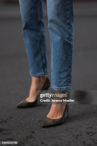 Leo Eberlin is seen wearing Zara blue skinny jeans and Gianvito Rossi olive leather heels on February 04, 2023 in Berlin, Germany.