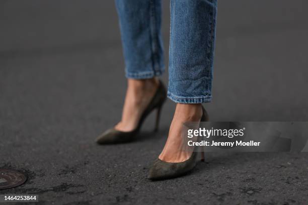 Leo Eberlin is seen wearing Zara blue skinny jeans and Gianvito Rossi olive leather heels on February 04, 2023 in Berlin, Germany.