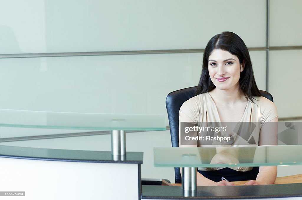 Portrait of receptionist smiling