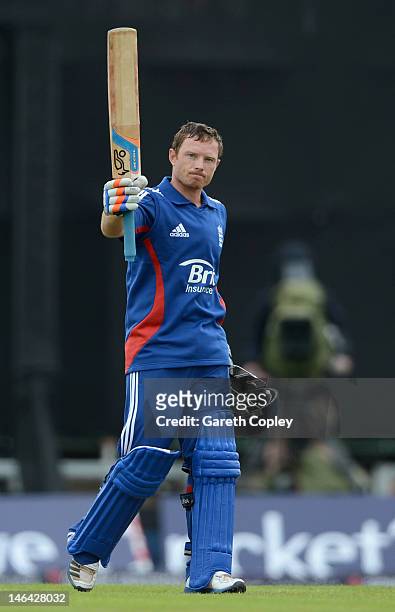 Ian Bell of England salutes the crowd after reaching his century during the 1st Natwest One Day International match between England and West Indies...