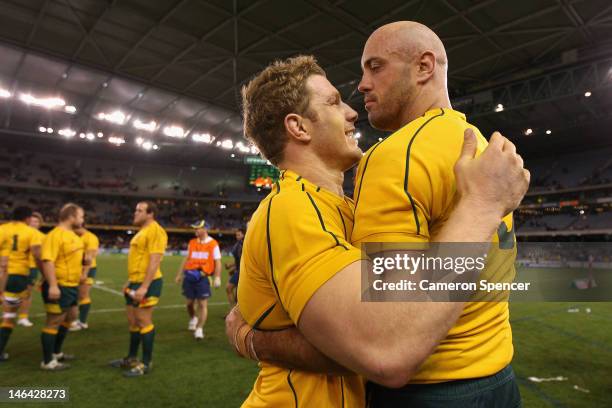 Wallabies captain David Pocock embraces team mate Nathan Sharpe after winning the International Test Match between the Australian Wallabies and Wales...