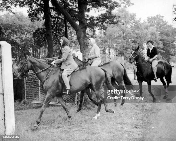 From left to right, the Duchess of Gloucester, Princess Alexandra of Kent and Lady Lily Serena Lumley arrive at Swinley Bottom, for the last day of...