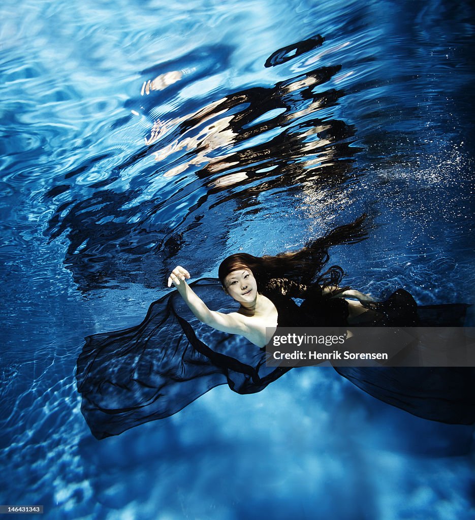 Female dancer under water