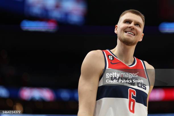 Kristaps Porzingis of the Washington Wizards reacts against the Charlotte Hornets during the second half at Capital One Arena on February 08, 2023 in...