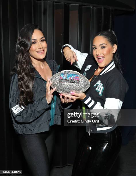 Brie Bella and Nikki Bella attend their live edition of SiriusXM's The Bellas Podcast on February 08, 2023 in Phoenix, Arizona.