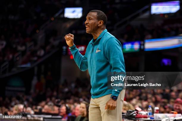 Dwane Casey head coach of the Detroit Pistons talks to his team during the second quarter of the game against the Cleveland Cavaliers at Rocket...