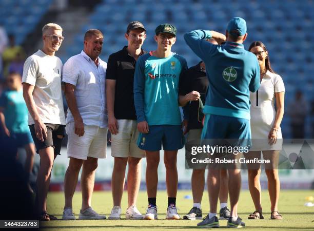 Todd Murphy of Australia is seen with his family after he was capped to play his first test match for Australia. During day one of the First Test...