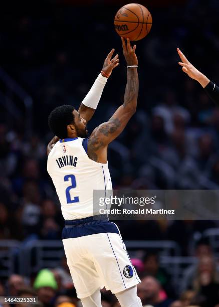 Kyrie Irving of the Dallas Mavericks makes a shot against the LA Clippers in the first half at Crypto.com Arena on February 08, 2023 in Los Angeles,...
