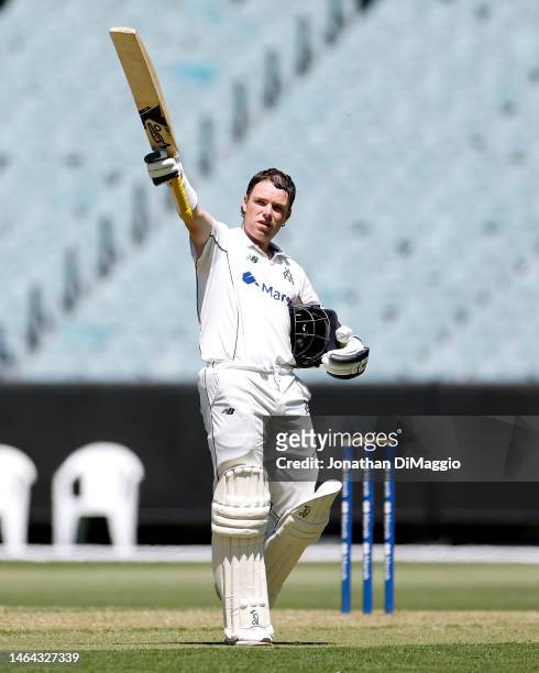 Marcus Harris of Victoria acknowledges the crowd as he makes 100 runs during the Sheffield Shield match between Victoria and Queensland at Melbourne...