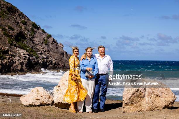 Queen Maxima of The Netherlands, Princess Amalia of The Netherlands and King Willem-Alexander of The Netherlands at the coast of the island during...