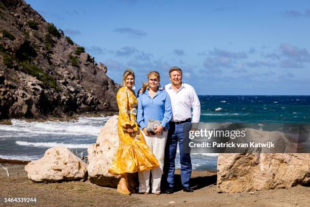 Queen Maxima of The Netherlands, Princess Amalia of The Netherlands and King Willem-Alexander of The Netherlands at the coast of the island during...