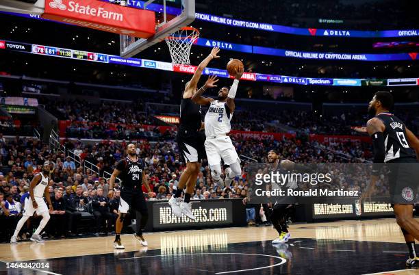 Kyrie Irving of the Dallas Mavericks takes a shot against Nicolas Batum of the LA Clippers in the second half at Crypto.com Arena on February 08,...
