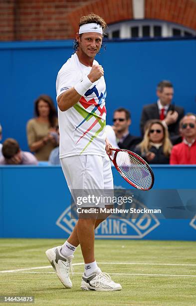David Nalbandian of Argentina celebrates match point after his mens singles semi-final match against Grigor Dimitrov of Bulgaria on day six of the...