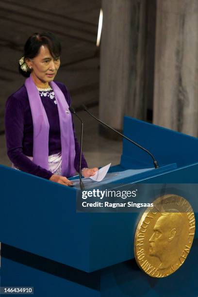 Nobel Laureate Aung San Suu Kyi delivers a speech during the Nobel Peace Prize lecture at Oslo City Hall on June 16, 2012 in Oslo, Norway. Aung San...