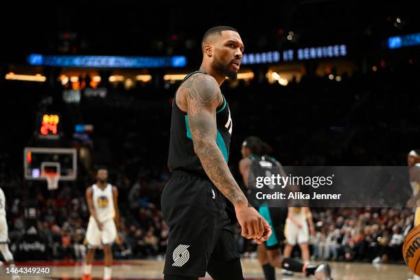 Damian Lillard of the Portland Trail Blazers looks on during the third quarter against the Golden State Warriors at the Moda Center on February 08,...