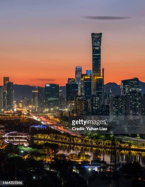 beijing guomao cbd night view - peking skyline stock-fotos und bilder