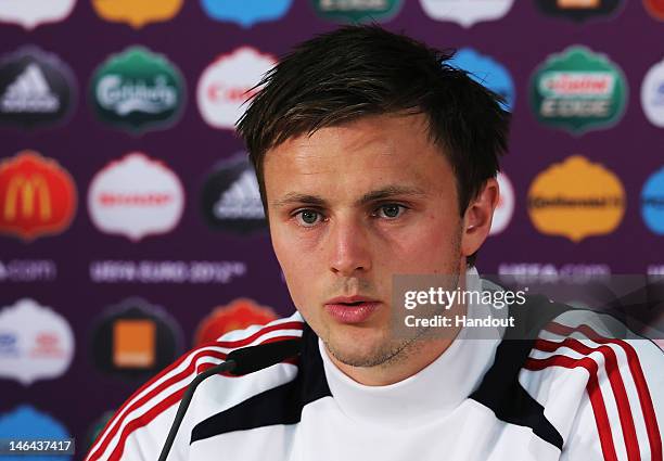 In this handout image provided by UEFA, William Kvist of Denmark talks to the media during a UEFA EURO 2012 press conference at the Arena Lviv on...