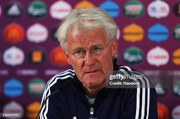 In this handout image provided by UEFA, head coach Morten Olsen of Denmark talks to the media during a UEFA EURO 2012 press conference at the Arena...