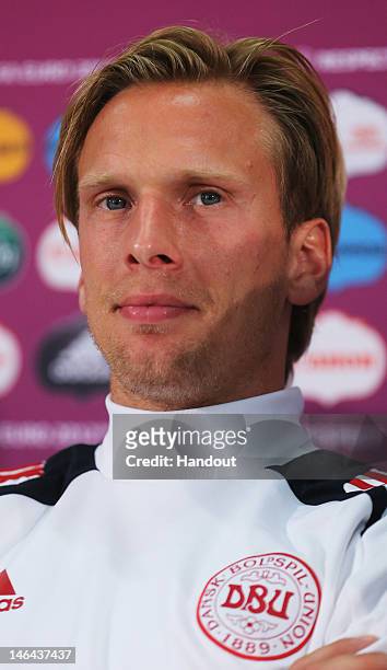 In this handout image provided by UEFA, Christian Poulsen of Denmark attends a UEFA EURO 2012 press conference at the Arena Lviv on June 16, 2012 in...