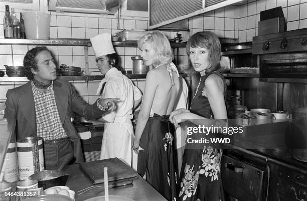 Designer Daniel Hechter poses with models. Daniel Hechter Spring 1973 Ready to Wear Collection Advance Preview