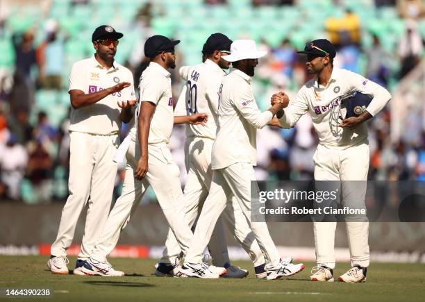 Ravindra Jadeja of India is congratulated by team mates after taking five wickets during day one of the First Test match in the series between India...